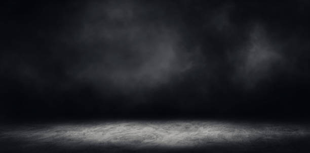 istock Studio dark room concrete floor grunge texture with fog or mist in background. 1285064718