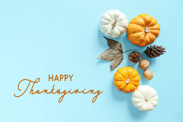 istock Happy Thanksgiving Day with pumpkin, maple leaf and nut 1285067294