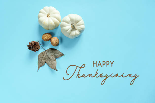 istock Happy Thanksgiving Day with pumpkin, maple leaf and nut 1285067337