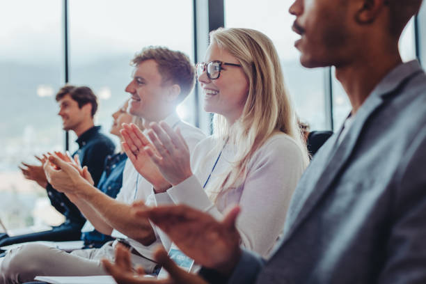 istock Businesspeople applauding the presentation 1285067709