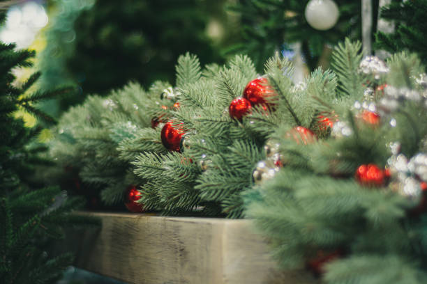 istock Christmas tree branches decorated with balls of red and silver colors 1285068971