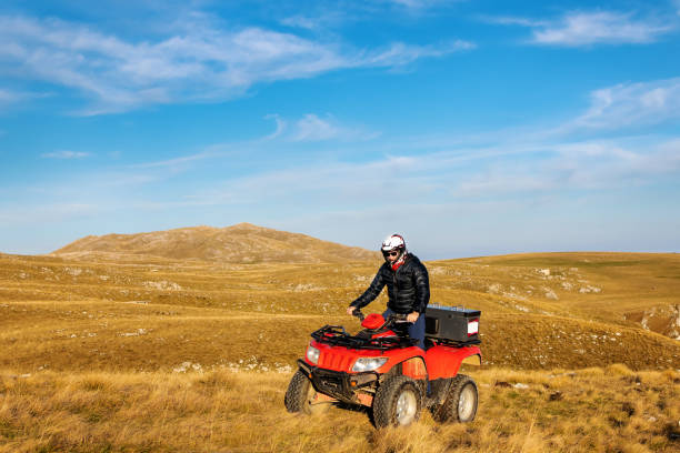 istock Quad biking in the mountains 1285070114
