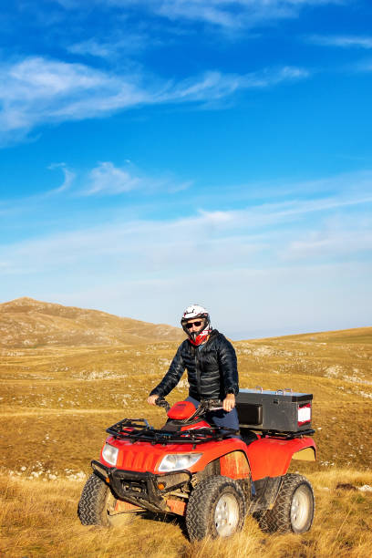 istock Quad biking in the mountains 1285070126
