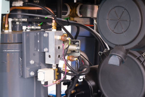 istock Electrical power generator. Powerful modern engine with wires, hoses and fittings 1285071321