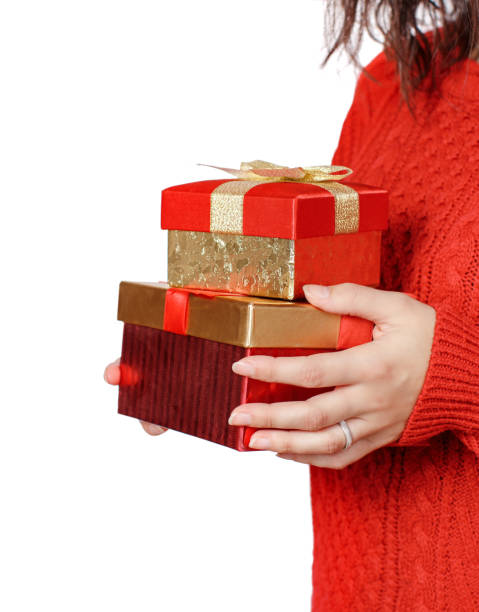 istock Young woman with Gift boxes in hands e close up 1285071565