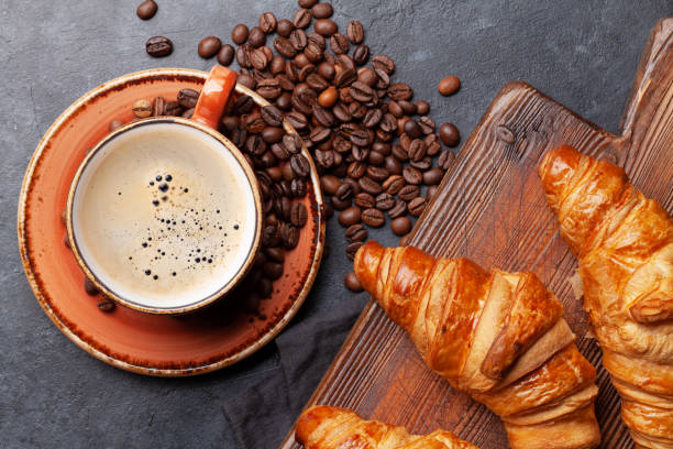istock Espresso coffee and croissants for breakfast 1285072963