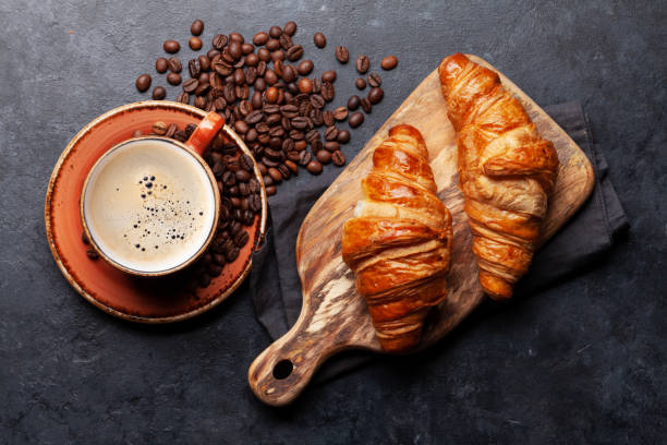 istock Espresso coffee and croissants for breakfast 1285072984