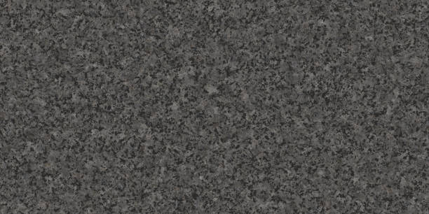 istock Matte marble textured stone spotty background in black and white. 1285077064