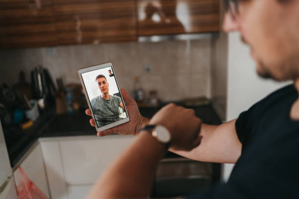 istock Receive a video call from friend 1285077257