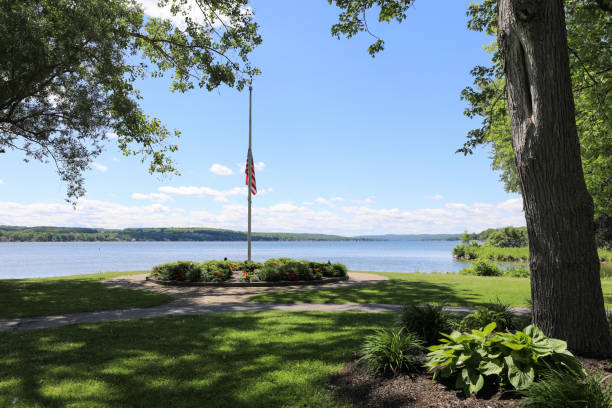 istock Flag at half staff on Conesus Lake 1285078902