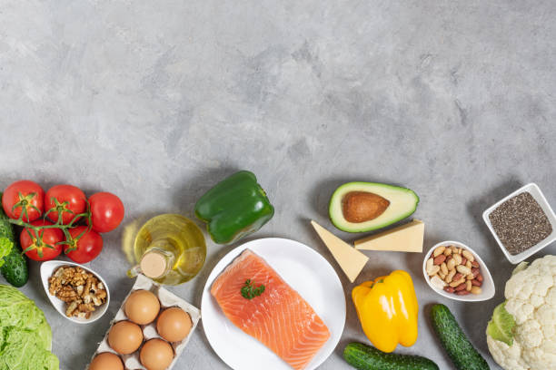 istock Ingredients for ketogenic diet top view on grey concrete table. 1285079040