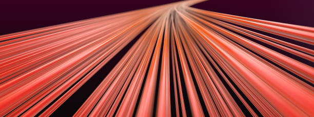 istock Abstract background with many lines or wires of red going into perspective and blurring on a dark purple background 1285079911
