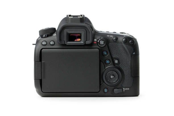 istock Rear view of modern DSLR camera on white background 1285080449