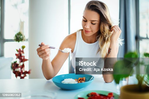 20,970 Eating Rice Stock Photos, Pictures & Royalty-Free Images - iStock |  Family eating rice, Woman eating rice, Kids eating rice