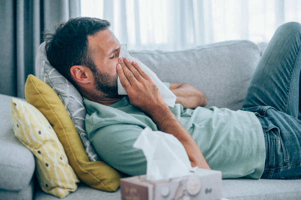 istock Man with high fever at home. 1285083537