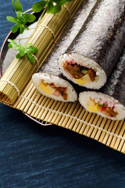 istock Eho-maki are thick sushi rolls which is believed to bring good fortune if eaten while facing the year's 