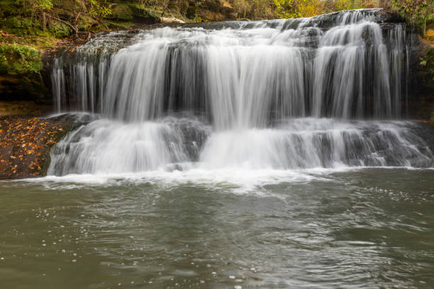 istock Big Trout Creek Waterfall In Autumn 1285086330