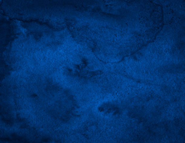 istock Navy blue Aquarelle patchy background with natural spots and stains. Ideas for creativity. 1285089709