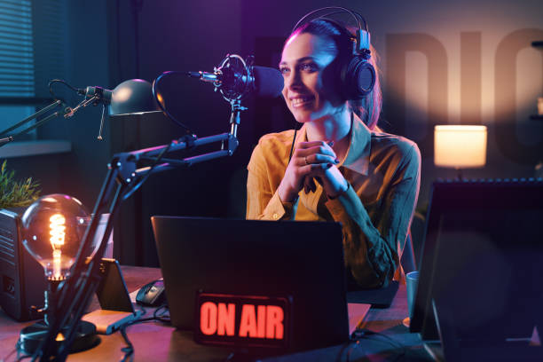 istock Young radio host broadcasting in the studio 1285089872