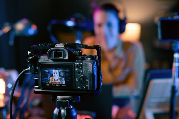istock Youtuber recording her video in the studio 1285090009