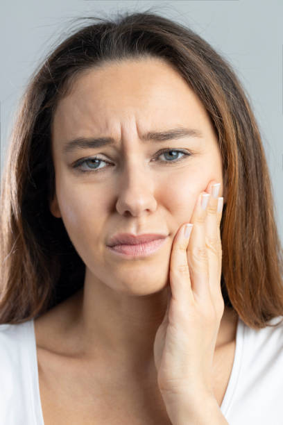 istock Young woman with toothache 1285091725