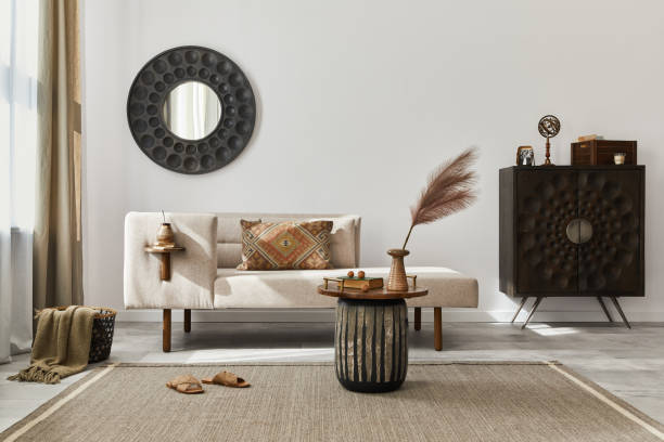Modern ethnic living room interior with design chaise lounge, round mirror, furniture, carpet, decoration, stool and elegant personal accessories. Template. Stylish home decor. Modern ethnic living room interior with design chaise lounge, round mirror, furniture, carpet, decoration, stool and elegant personal accessories. Template. Stylish home decor. chaise longue photos stock pictures, royalty-free photos & images