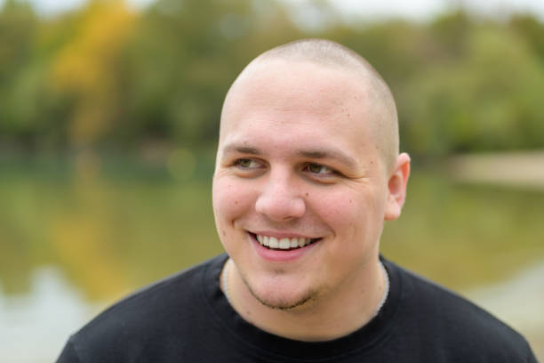 istock Happy young man laughing at the camera 1285097519