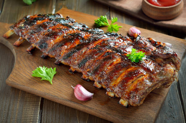 istock Spicy hot grilled spare ribs on cutting board 1285097938