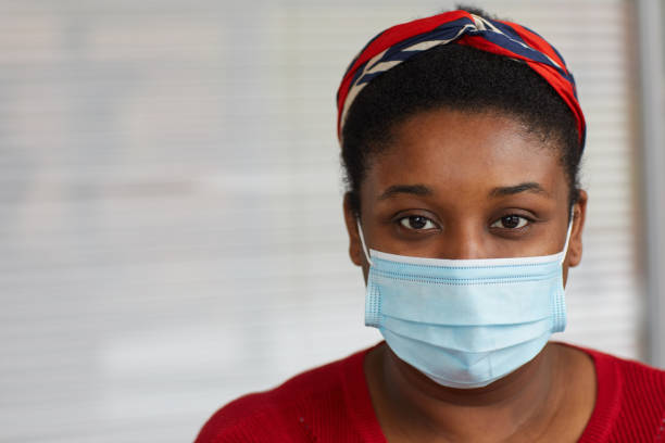 istock Woman in protective mask 1285099195