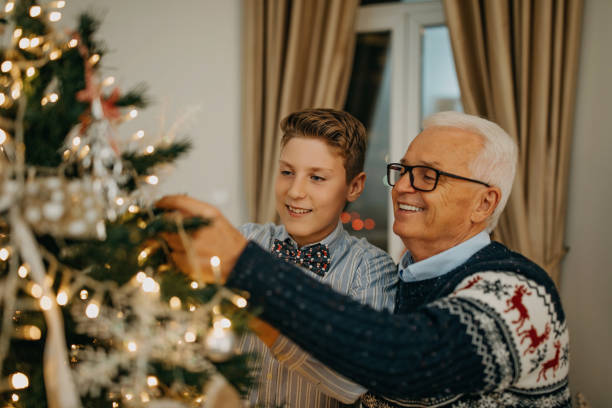istock Grandfather and grandson preparing for New year 1285106765