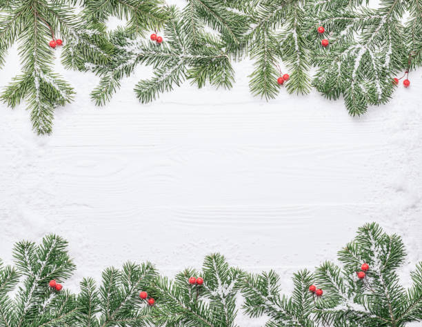 istock New Year background with green branches with Christmas decorations. Flat lay 1285106801