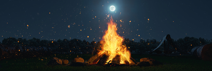 3d rendering of big bonfire with sparks and particles in front of forest and moonlight