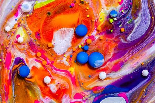 istock Fluid art texture. Background with abstract swirling paint effect. Liquid acrylic picture with flowing bubbles. Mixed paints for posters or wallpapers. Vibrant overflowing colors. 1285113464
