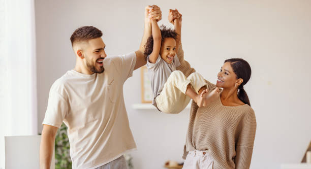 istock Diverse family playing at home 1285114244
