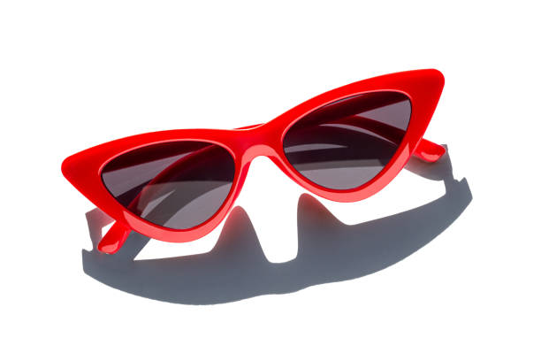 istock Red sunglasses seamless pattern isolated over white. sunglasses with harsh shadows as summer concept. 1285115731