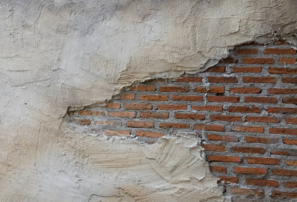 istock Brick, block, orange and mortar wall  as texture background 1285116423