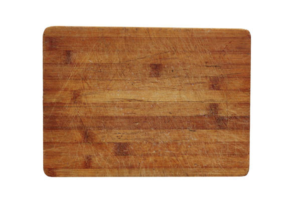 istock Wooden cutting Board isolated on a white background. Empty surface for slicing vegetables, fruits and meat 1285120078