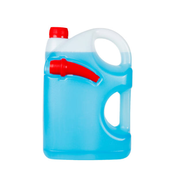 istock Blue windshield washer fluid in canister isolated on white background. Antifreeze for car screen wash 1285121179