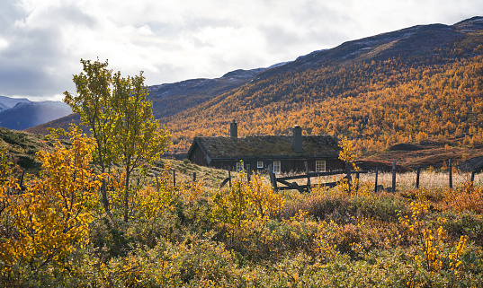 Hemsedal, Norway - October 22, 2018 Bulidalen mountain area with autumn colors and traditional cabin.