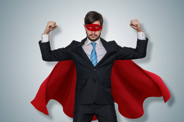 istock Strong funny businessman in suit as superhero. 1285121291