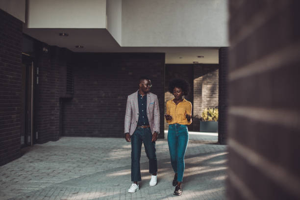 istock Young couple walking together. 1285122547