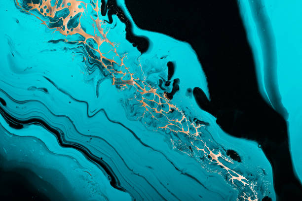 istock Fluid Art. Golden wave in luxurious turquoise swirls. Marble effect background or texture 1285122859