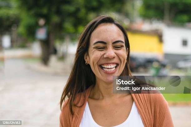 Smiling Woman In The City Stock Photo - Download Image Now - One Woman Only, Smiling, Happiness