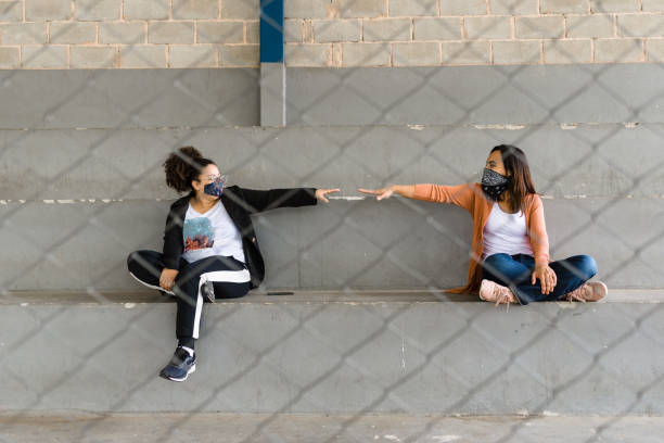 istock Women in social distance 1285124208
