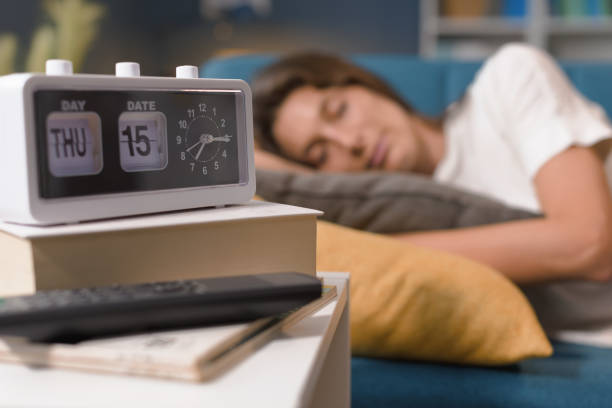 istock Relaxed woman sleeping on the sofa at home 1285126794