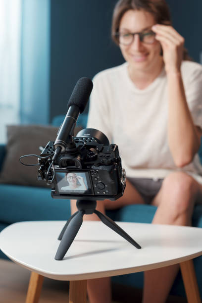 istock Professional youtuber and vlogger shooting a video at home 1285126986