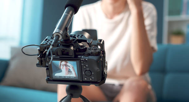 istock Professional youtuber and vlogger shooting a video at home 1285127005