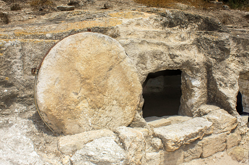 Nazareth / Israel – July 11, 2010: View of a roadside rolling stone tomb near Nazareth,  Israel.