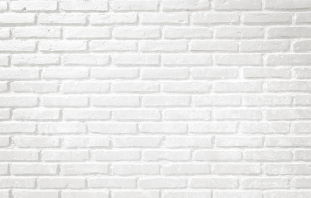 istock Modern white vintage brick wall texture for background retro white Washed, Old Brick Wall Surface Grunge Shabby Background weathered texture stained, old stucco light gray, and paint white brick wall. 1285129826