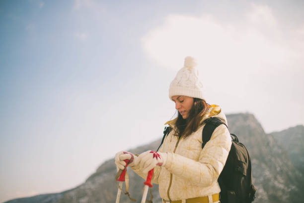 istock Young woman enjoying winter in mountains 1285130294